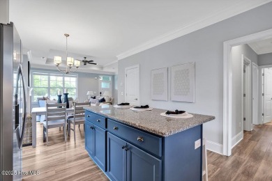 This beautiful and well-maintained coastal home is within on Cape Fear National At Brunswick Forest in North Carolina - for sale on GolfHomes.com, golf home, golf lot