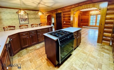 This is a one of a kind property nestled on the mountainside on Fairmont Hot Springs Resort in Montana - for sale on GolfHomes.com, golf home, golf lot