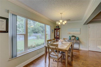 PRICED TO SELL - Welcome home, where comfort meets elegance in on Bayou Golf Club in Florida - for sale on GolfHomes.com, golf home, golf lot