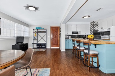 Beautifully renovated Florida cottage packed with coastal charm on Saint Josephs Bay Country Club in Florida - for sale on GolfHomes.com, golf home, golf lot