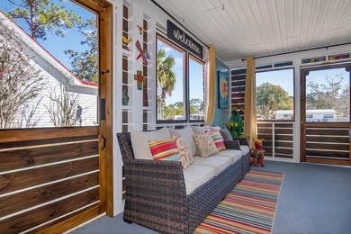 Beautifully renovated Florida cottage packed with coastal charm on Saint Josephs Bay Country Club in Florida - for sale on GolfHomes.com, golf home, golf lot