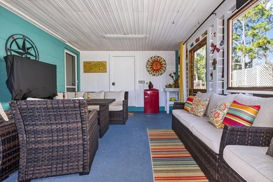 Beautifully renovated Florida cottage packed with coastal charm on Saint Josephs Bay Country Club in Florida - for sale on GolfHomes.com, golf home, golf lot