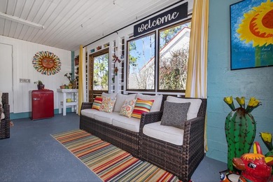 Beautifully renovated Florida cottage packed with coastal charm on Saint Josephs Bay Country Club in Florida - for sale on GolfHomes.com, golf home, golf lot