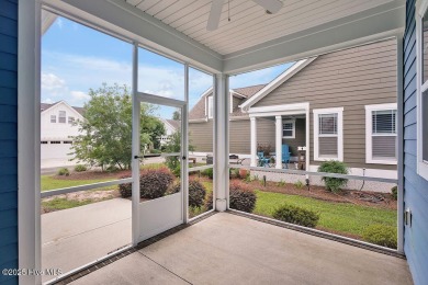 This beautiful and well-maintained coastal home is within on Cape Fear National At Brunswick Forest in North Carolina - for sale on GolfHomes.com, golf home, golf lot