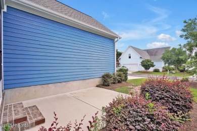 This beautiful and well-maintained coastal home is within on Cape Fear National At Brunswick Forest in North Carolina - for sale on GolfHomes.com, golf home, golf lot