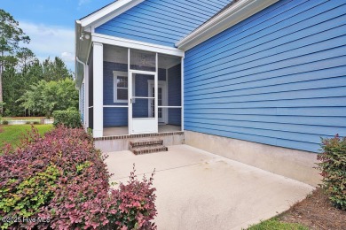 This beautiful and well-maintained coastal home is within on Cape Fear National At Brunswick Forest in North Carolina - for sale on GolfHomes.com, golf home, golf lot
