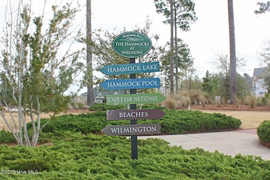This beautiful and well-maintained coastal home is within on Cape Fear National At Brunswick Forest in North Carolina - for sale on GolfHomes.com, golf home, golf lot