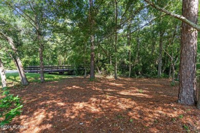 This unique 0.16-acre lot is located on a corner in Winding on Carolina National Golf Club in North Carolina - for sale on GolfHomes.com, golf home, golf lot