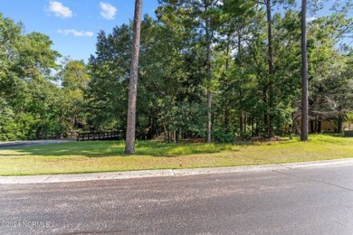 This unique 0.16-acre lot is located on a corner in Winding on Carolina National Golf Club in North Carolina - for sale on GolfHomes.com, golf home, golf lot