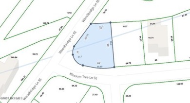 This unique 0.16-acre lot is located on a corner in Winding on Carolina National Golf Club in North Carolina - for sale on GolfHomes.com, golf home, golf lot