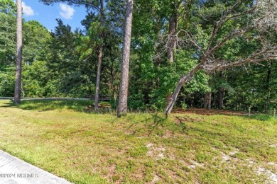 This unique 0.16-acre lot is located on a corner in Winding on Carolina National Golf Club in North Carolina - for sale on GolfHomes.com, golf home, golf lot