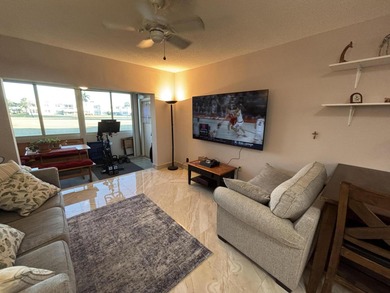 Enjoy picturesque golf course views from this open floor plan on Leisureville Community Association in Florida - for sale on GolfHomes.com, golf home, golf lot