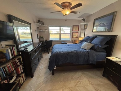 Enjoy picturesque golf course views from this open floor plan on Leisureville Community Association in Florida - for sale on GolfHomes.com, golf home, golf lot