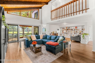 Spectacular lake, golf course, and tree-lined views! A welcoming on Suntree Country Club in Florida - for sale on GolfHomes.com, golf home, golf lot