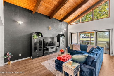 Spectacular lake, golf course, and tree-lined views! A welcoming on Suntree Country Club in Florida - for sale on GolfHomes.com, golf home, golf lot