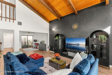 Spectacular lake, golf course, and tree-lined views! A welcoming on Suntree Country Club in Florida - for sale on GolfHomes.com, golf home, golf lot