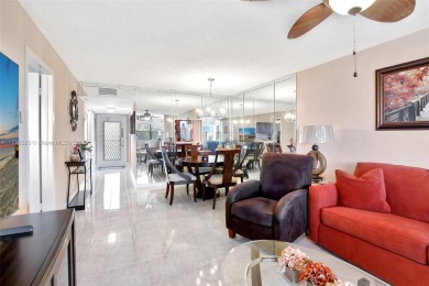 Welcome Home to this spacious unit overlooking the tranquil on Sunrise Lakes Phase IV Golf Course in Florida - for sale on GolfHomes.com, golf home, golf lot