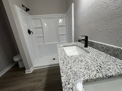 Move-in ready new construction built in 2025, located just one on Dothan National Golf Club and Hotel in Alabama - for sale on GolfHomes.com, golf home, golf lot