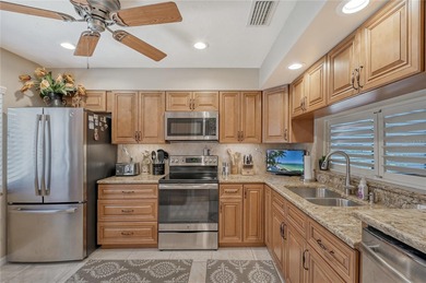 Nestled within the lush, established setting of The Meadows on The Meadows Golf and Country Club in Florida - for sale on GolfHomes.com, golf home, golf lot