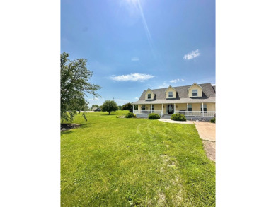 Country like setting on a hard surface road, minutes from town on Prairie View Golf and Grill in Iowa - for sale on GolfHomes.com, golf home, golf lot