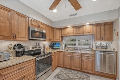 Nestled within the lush, established setting of The Meadows on The Meadows Golf and Country Club in Florida - for sale on GolfHomes.com, golf home, golf lot