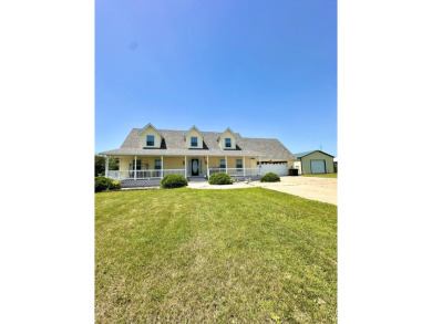Country like setting on a hard surface road, minutes from town on Prairie View Golf and Grill in Iowa - for sale on GolfHomes.com, golf home, golf lot