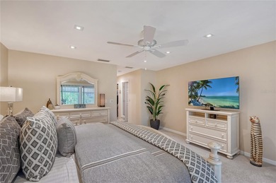 Nestled within the lush, established setting of The Meadows on The Meadows Golf and Country Club in Florida - for sale on GolfHomes.com, golf home, golf lot