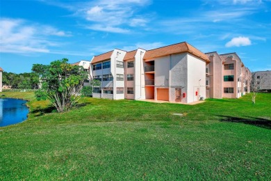 Welcome Home to this spacious unit overlooking the tranquil on Sunrise Lakes Phase IV Golf Course in Florida - for sale on GolfHomes.com, golf home, golf lot