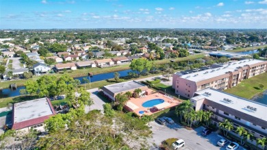 Welcome Home to this spacious unit overlooking the tranquil on Sunrise Lakes Phase IV Golf Course in Florida - for sale on GolfHomes.com, golf home, golf lot