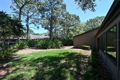 Nestled within the lush, established setting of The Meadows on The Meadows Golf and Country Club in Florida - for sale on GolfHomes.com, golf home, golf lot
