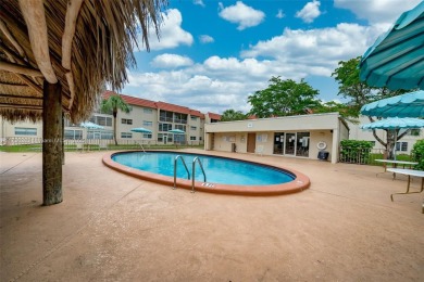 Welcome Home to this spacious unit overlooking the tranquil on Sunrise Lakes Phase IV Golf Course in Florida - for sale on GolfHomes.com, golf home, golf lot