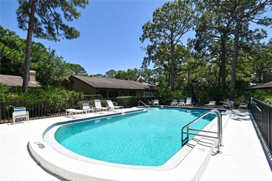 Nestled within the lush, established setting of The Meadows on The Meadows Golf and Country Club in Florida - for sale on GolfHomes.com, golf home, golf lot