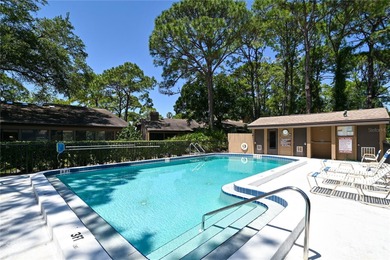 Nestled within the lush, established setting of The Meadows on The Meadows Golf and Country Club in Florida - for sale on GolfHomes.com, golf home, golf lot