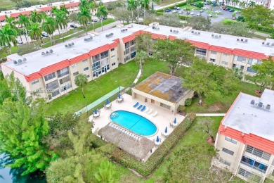 Welcome Home to this spacious unit overlooking the tranquil on Sunrise Lakes Phase IV Golf Course in Florida - for sale on GolfHomes.com, golf home, golf lot