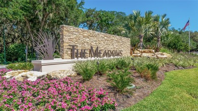 Nestled within the lush, established setting of The Meadows on The Meadows Golf and Country Club in Florida - for sale on GolfHomes.com, golf home, golf lot