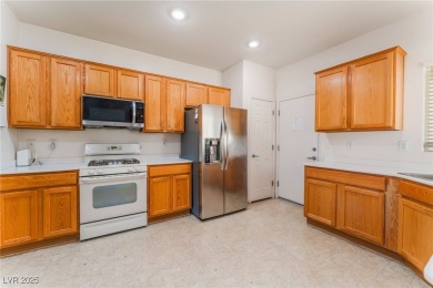 Welcome home to this Charming Heather Model in Sun City Aliante on Aliante Golf Club in Nevada - for sale on GolfHomes.com, golf home, golf lot