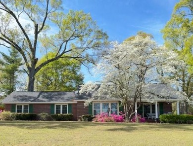 Brick ranch-style home with three bedrooms, two baths, within on Santee National Golf Course in South Carolina - for sale on GolfHomes.com, golf home, golf lot