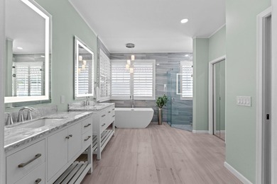 Set on the fairways of Wanderers Golf Course, this beautifully on  in Florida - for sale on GolfHomes.com, golf home, golf lot