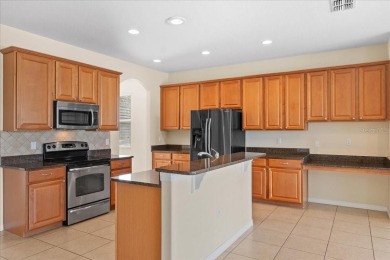 Welcome to this 5-bedroom, 3-bath POOL home in the popular gated on Providence Golf Club in Florida - for sale on GolfHomes.com, golf home, golf lot