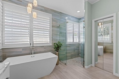 Set on the fairways of Wanderers Golf Course, this beautifully on The Wanderers Club in Florida - for sale on GolfHomes.com, golf home, golf lot