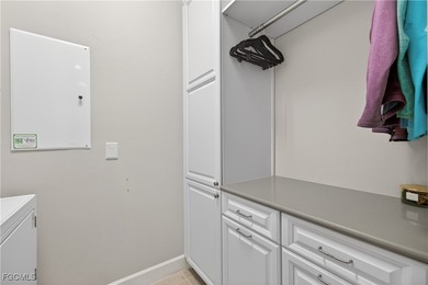 This beauty is stacked with LUXURY UPGRADES! Outdoor kitchen on The Plantation Golf and Country Club in Florida - for sale on GolfHomes.com, golf home, golf lot