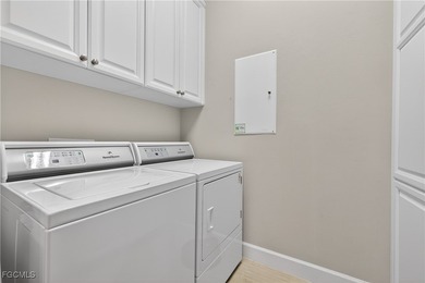 This beauty is stacked with LUXURY UPGRADES! Outdoor kitchen on The Plantation Golf and Country Club in Florida - for sale on GolfHomes.com, golf home, golf lot