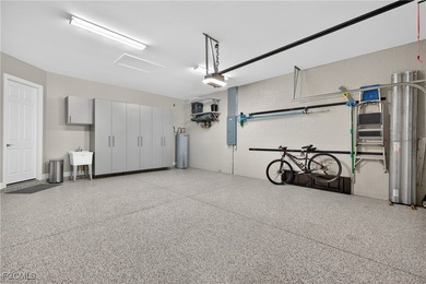 This beauty is stacked with LUXURY UPGRADES! Outdoor kitchen on The Plantation Golf and Country Club in Florida - for sale on GolfHomes.com, golf home, golf lot