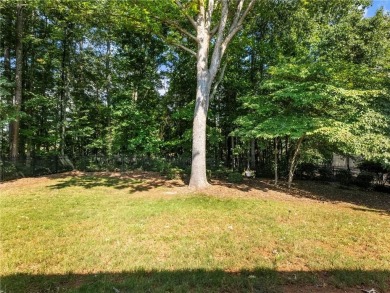 Welcome to this charming STEPLESS BRICK RANCH perfectly on Trophy Club of Apalachee in Georgia - for sale on GolfHomes.com, golf home, golf lot