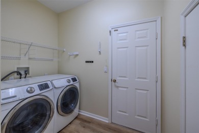 This 5-bedroom 3 bath home is located in the highly sought-after on River Hills Country Club in Florida - for sale on GolfHomes.com, golf home, golf lot