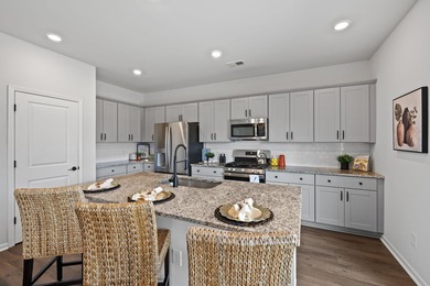 This stunning 4-bedroom, 2.5-bathroom home in the highly on Legend Oaks Plantation Golf Club in South Carolina - for sale on GolfHomes.com, golf home, golf lot