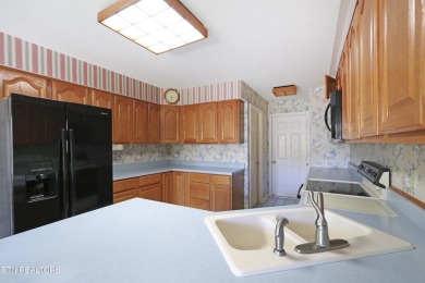 Welcome to this charming home in The Greens at Toqua within on Toqua Golf Course - Loudon County in Tennessee - for sale on GolfHomes.com, golf home, golf lot