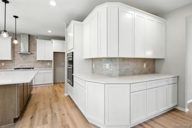 New construction, move-in ready and available to close within 30 on Prestwick Village Golf Club in Michigan - for sale on GolfHomes.com, golf home, golf lot