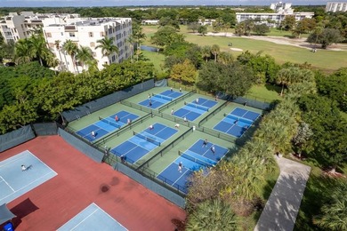 This beautifully remodeled 2-bed, 2-bth residence is located on on Palm-Aire Country Club and Resort - The Oaks in Florida - for sale on GolfHomes.com, golf home, golf lot