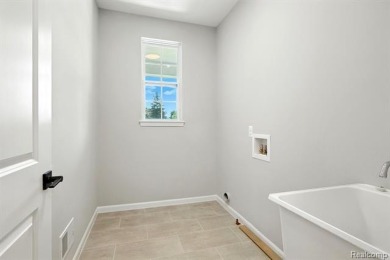 New construction, move-in ready and available to close within 30 on Prestwick Village Golf Club in Michigan - for sale on GolfHomes.com, golf home, golf lot